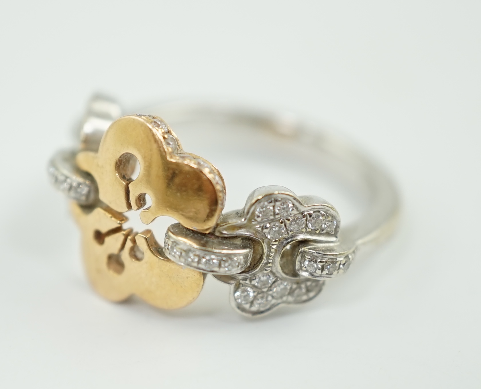 A modern Boodles & Dunthorne two colour 18ct gold and diamond chip set dress ring